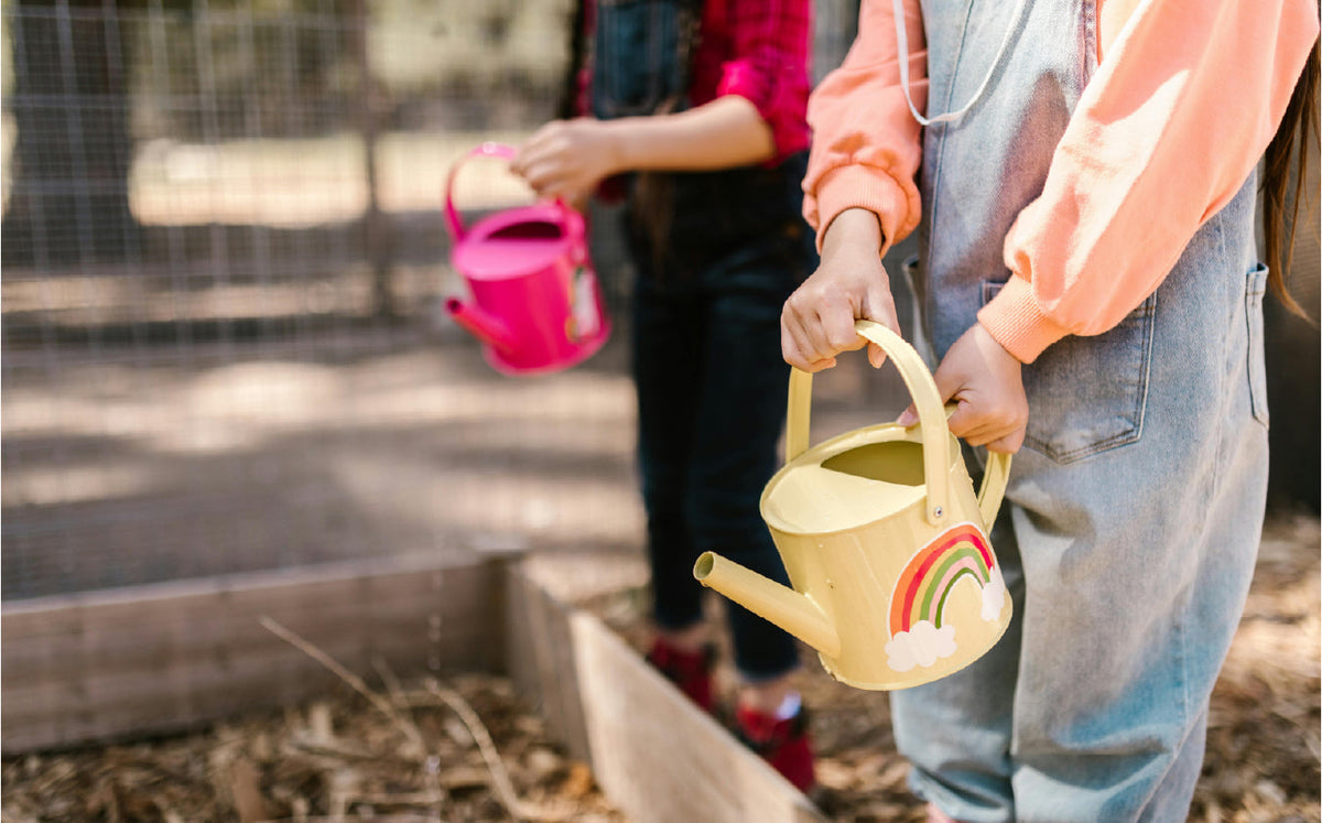 Play Up brand image of two children on the beach