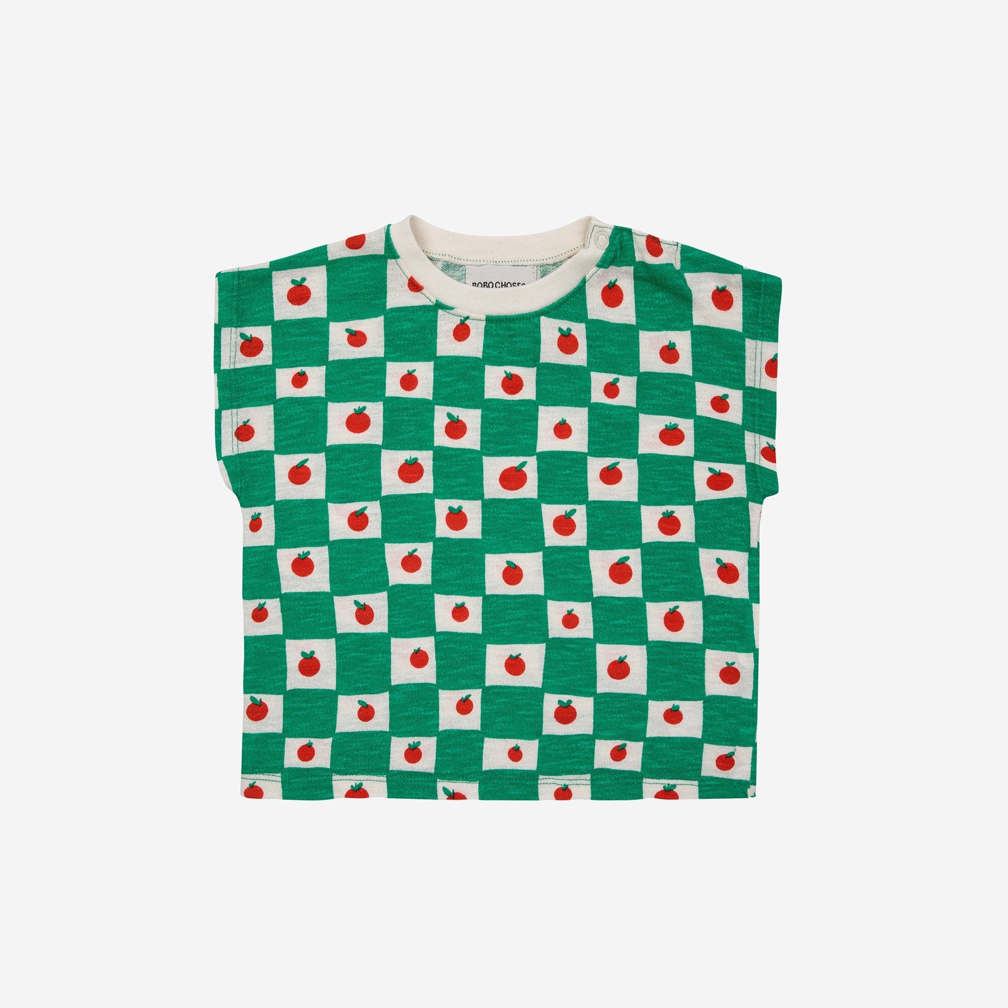 child wearing green and white checked t-shirt with tomato print
