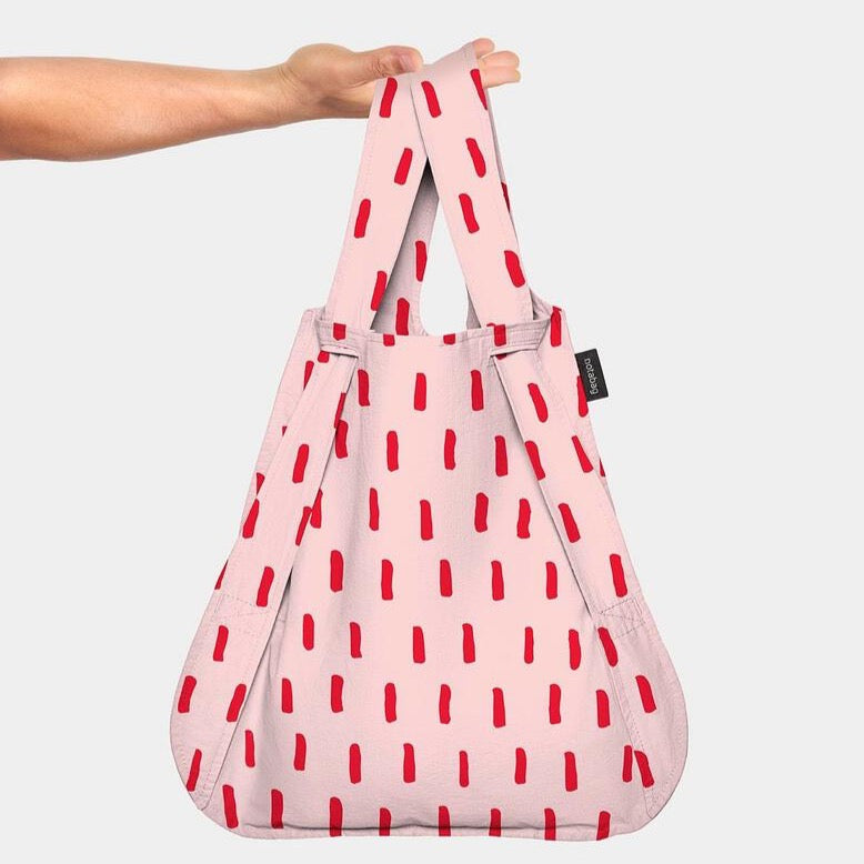 holding straps on tote bag