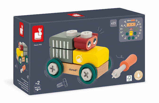 Toy truck set in a Janod box on a white background