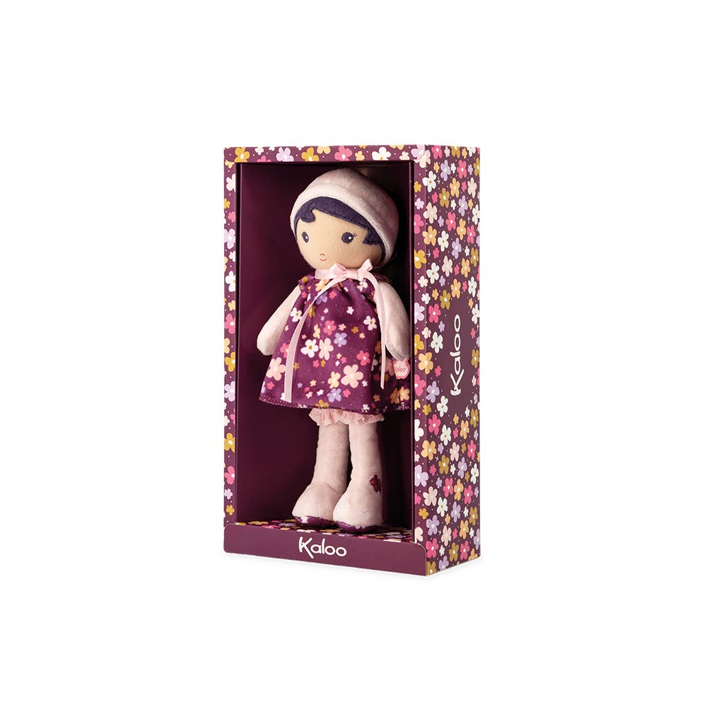 Stuffed doll in a floral-patterned box with 'Kaloo' branding on a white background