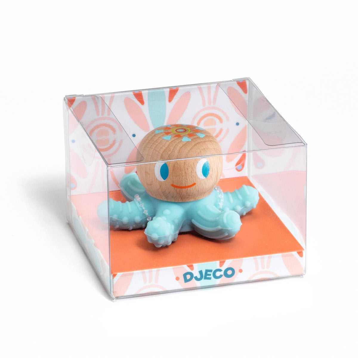 Toy octopus in a clear box with a colorful pattern on a white background