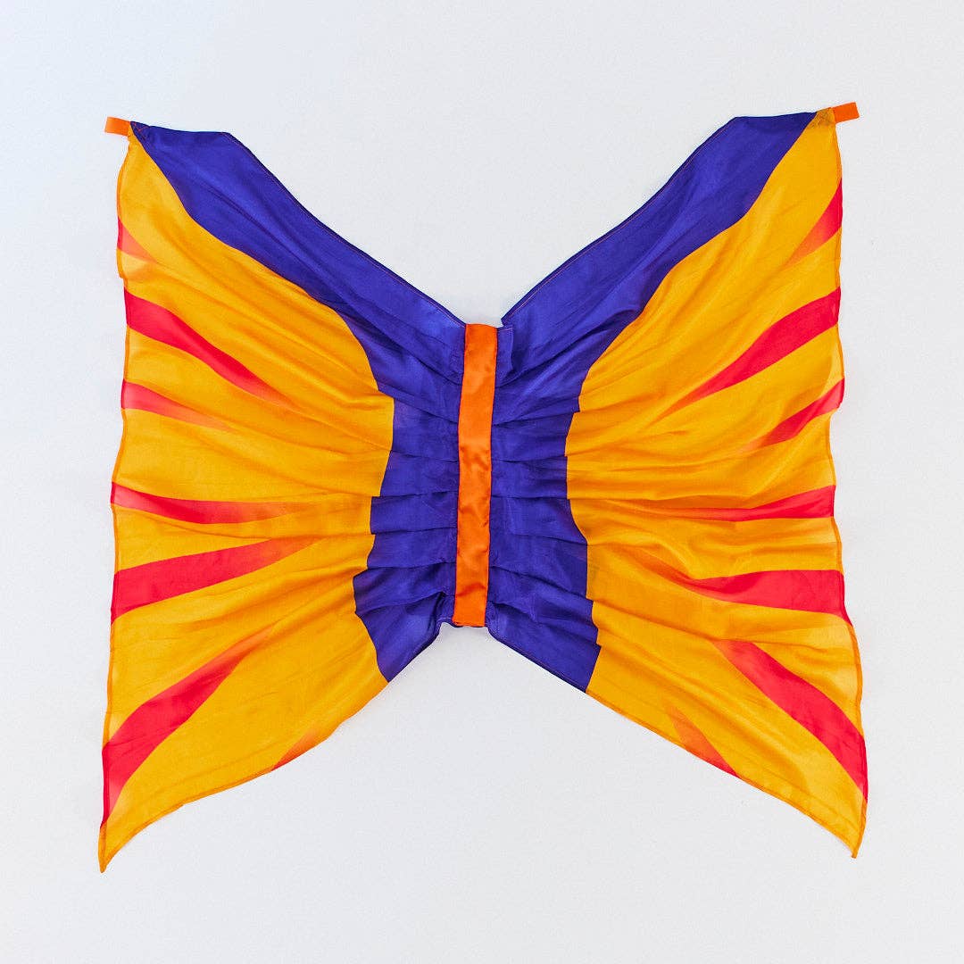 Colorful butterfly-shaped fabric on a white background