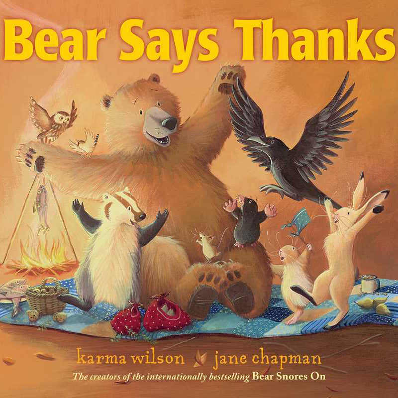 Book cover of 'Bear Says Thanks' featuring a bear and various animals around a picnic blanket.
