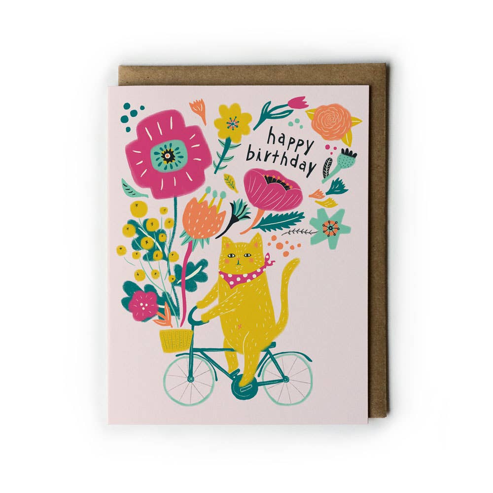 Birthday card with a cat riding a bike and flowers, on a white background