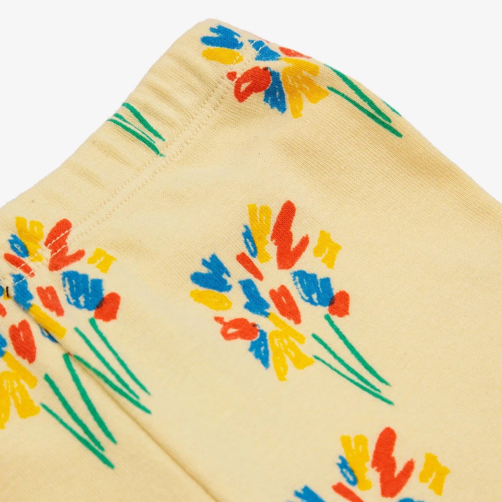 yellow pants with colorful fireworks pattern