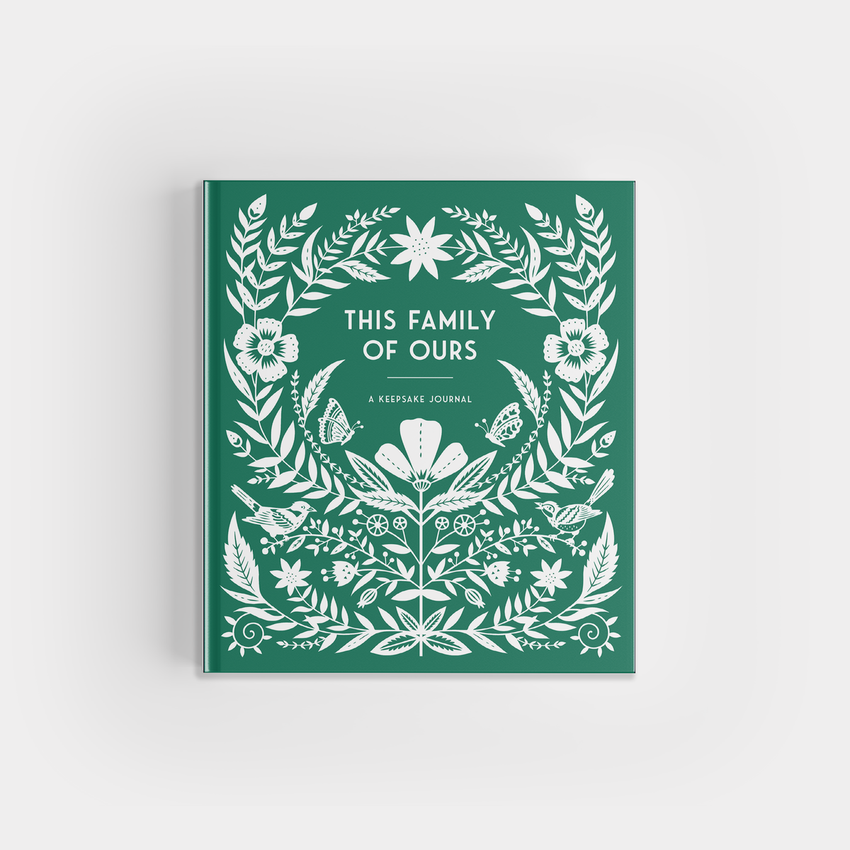 Green book cover with white floral design and text on a light gray background