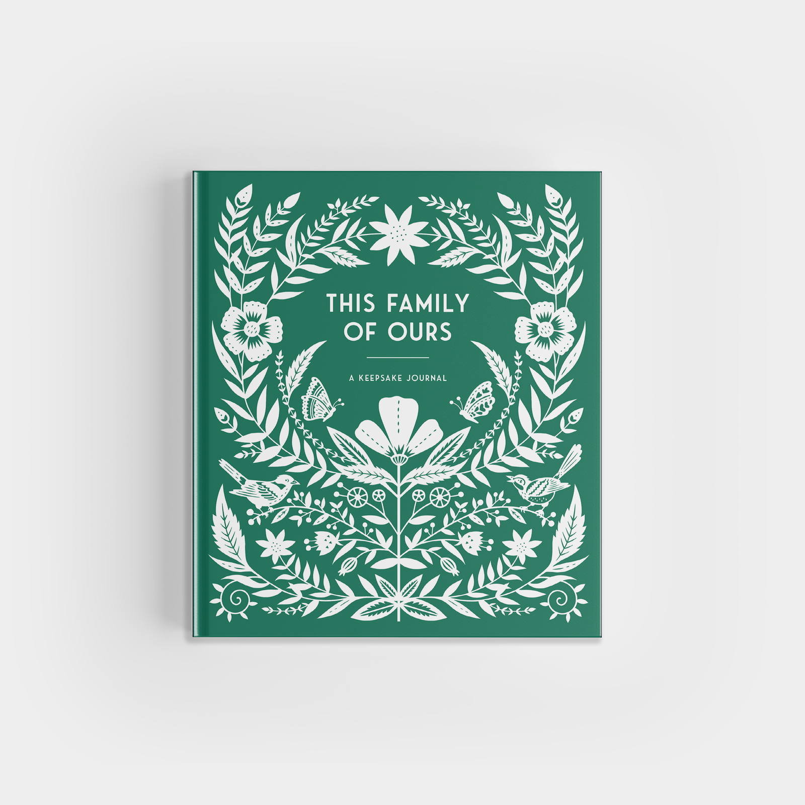 Green book cover with white floral design and text on a light gray background