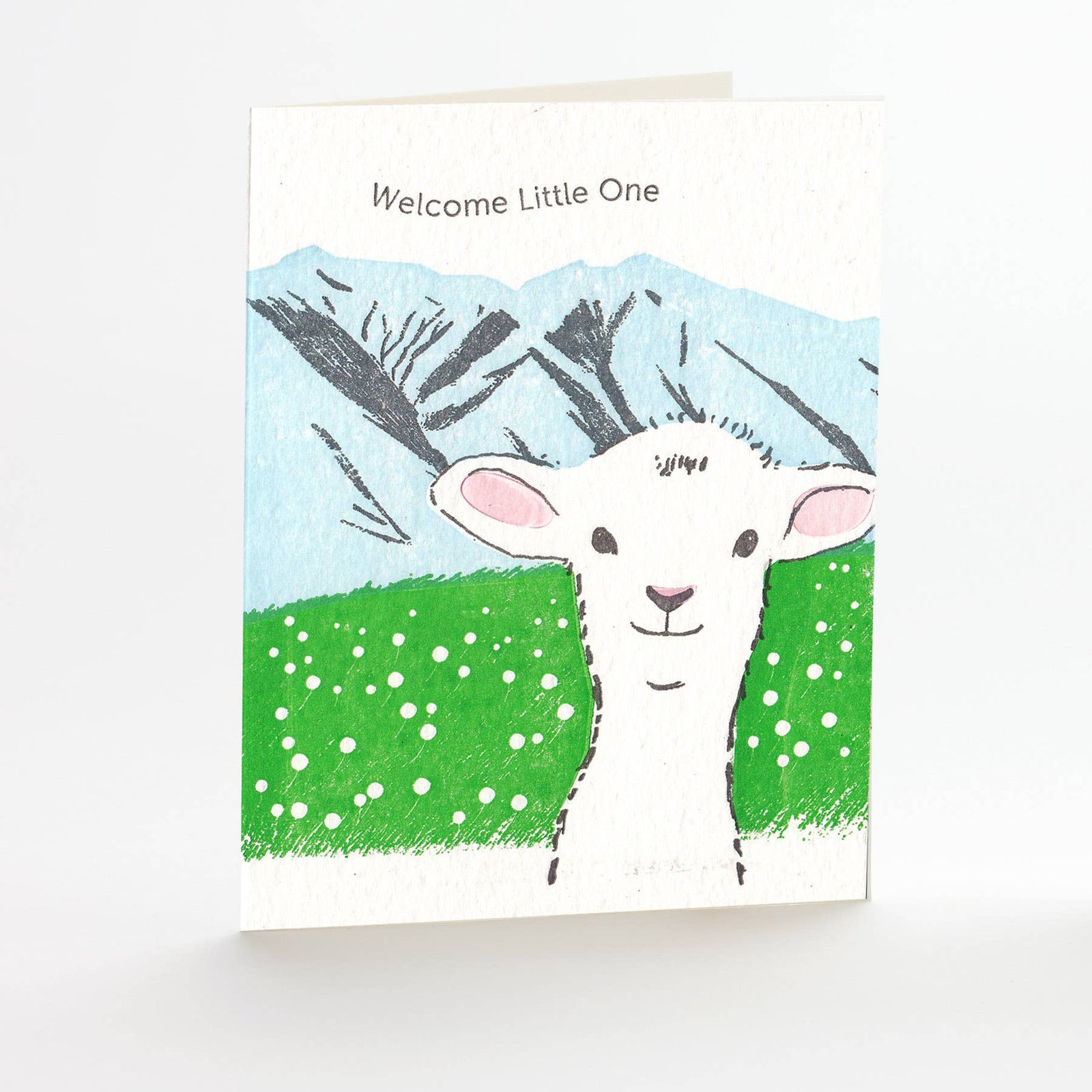 Greeting card with a drawing of a lamb and text 'Welcome Little One' on a white background