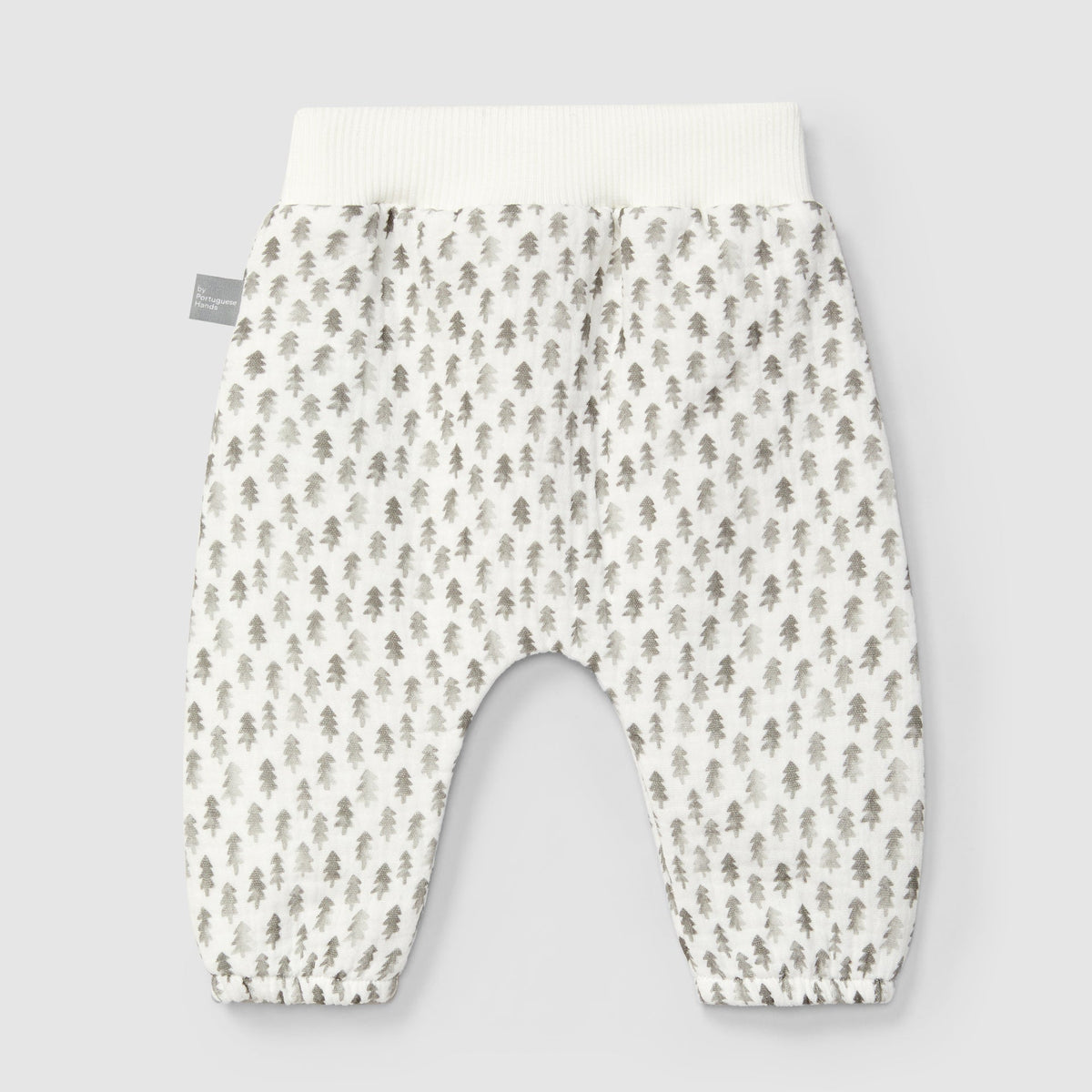 Baby pants with a subtle pattern on a light gray background