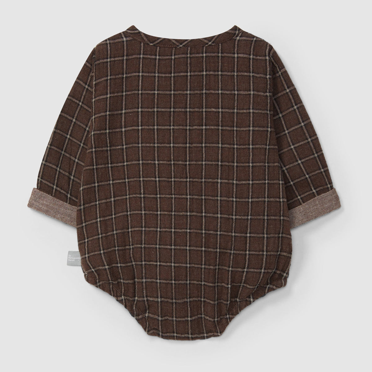 Brown checkered baby romper on a light gray background