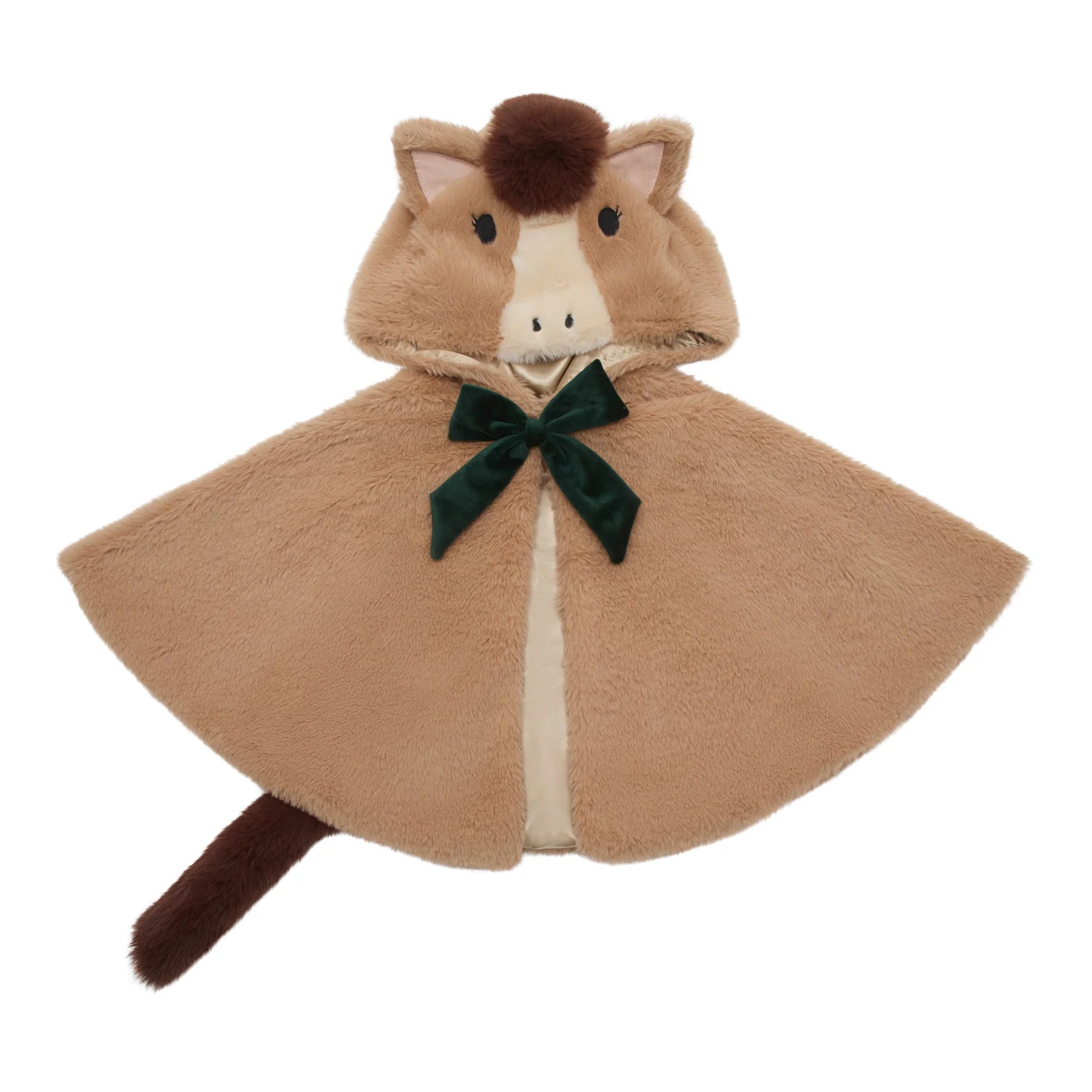 Child wearing a horse-themed poncho with a hood, holding a small horse plush toy.