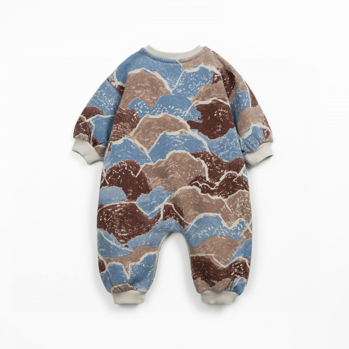 Baby onesie with camouflage pattern on a white background