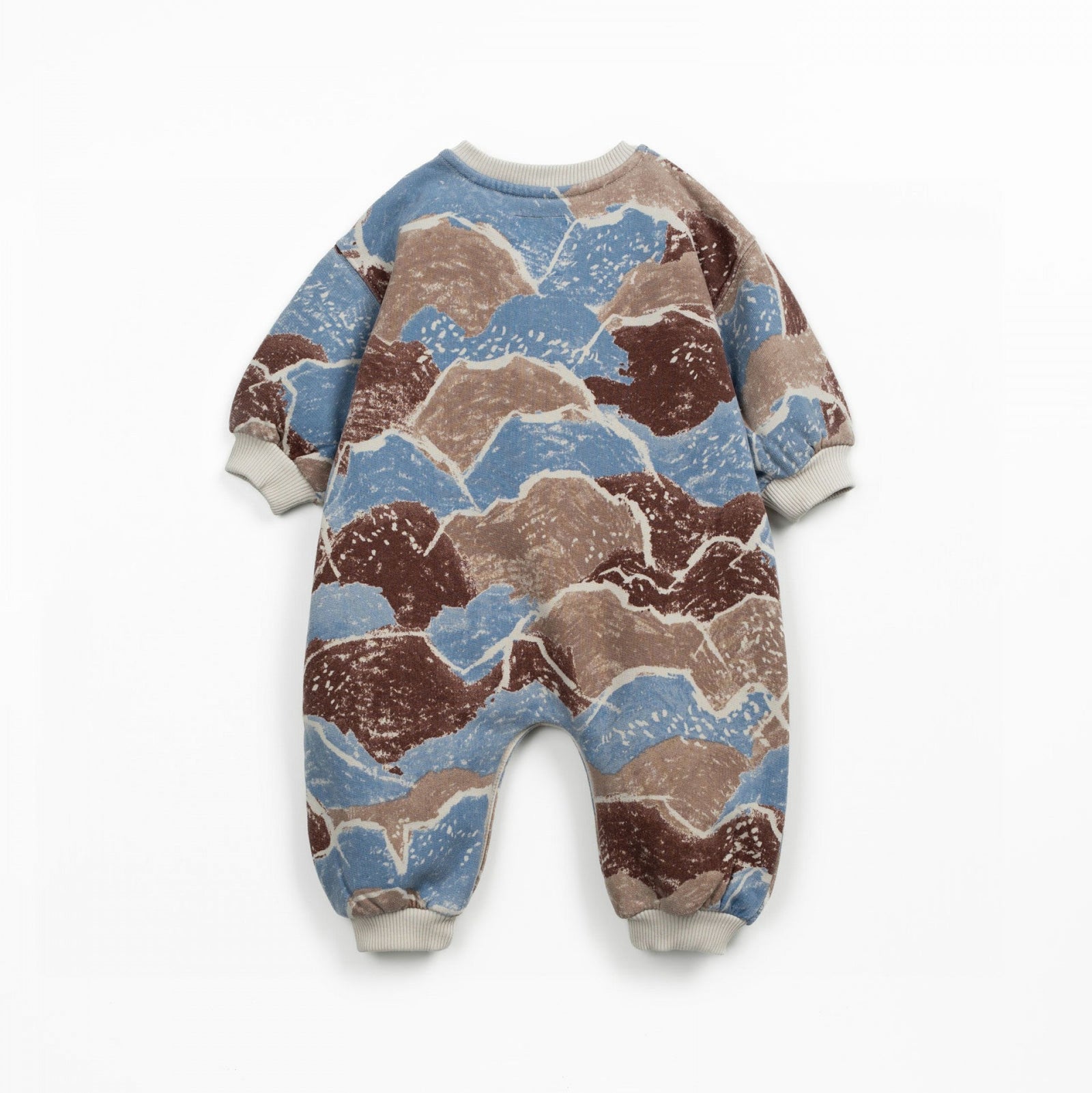 Camouflage-patterned baby onesie on a white background