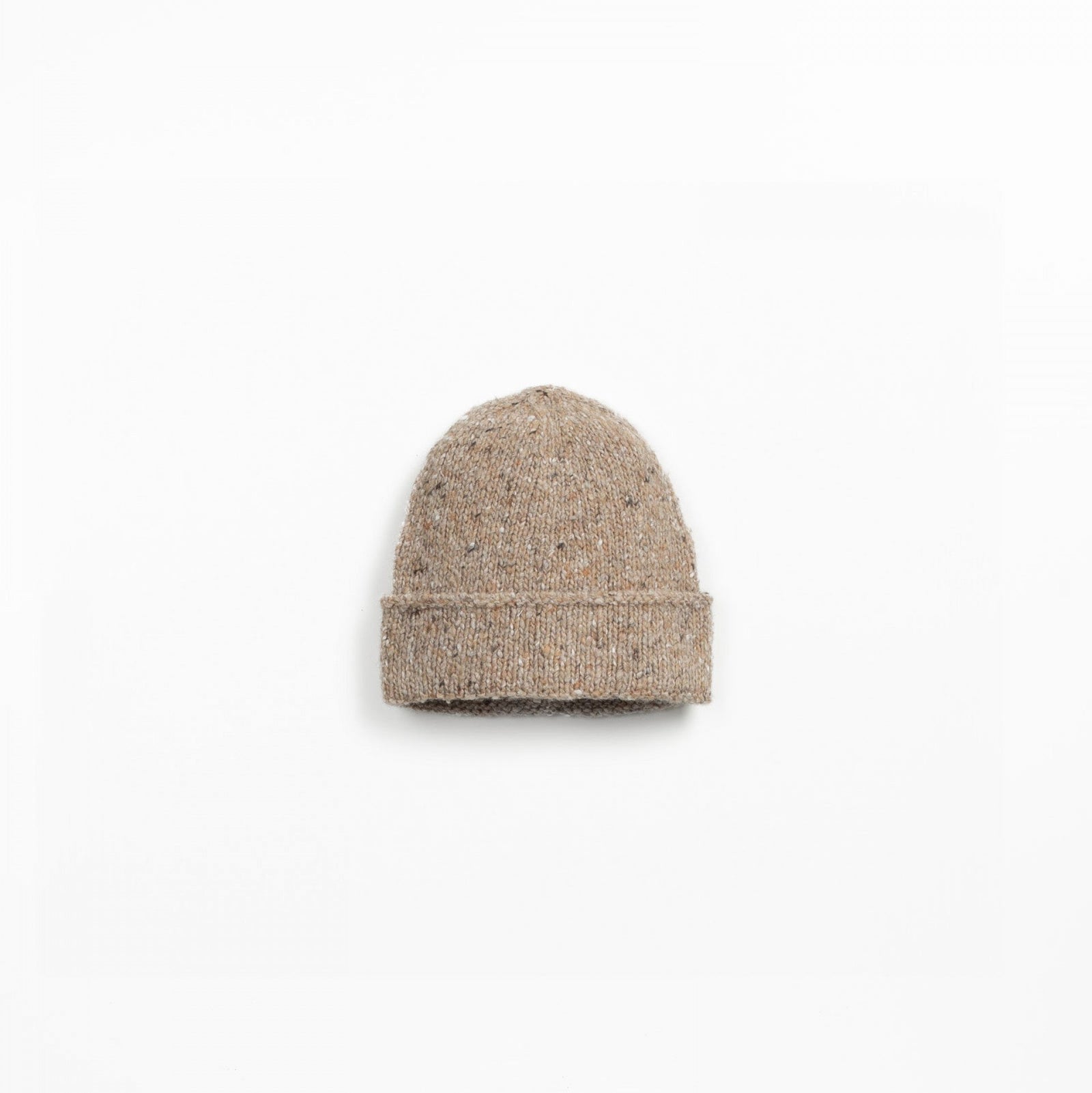 Beige knit beanie on a white background