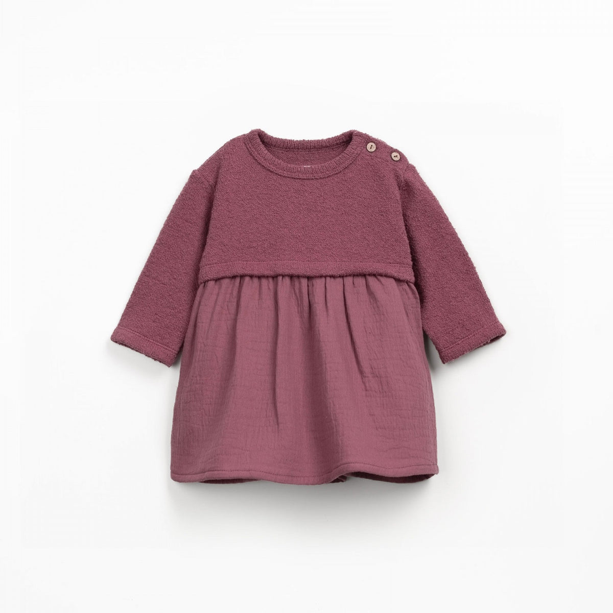 Purple dress with long sleeves on a white background