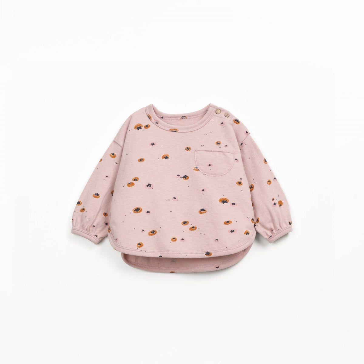 Pink sweatshirt with small patterns on a white background