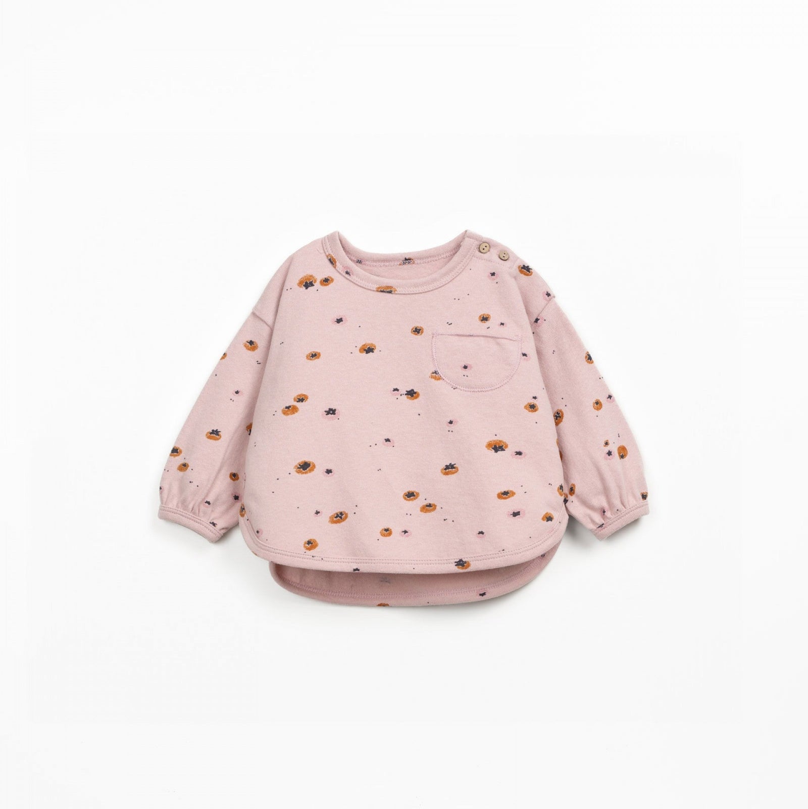 Pink sweatshirt with small patterns on a white background