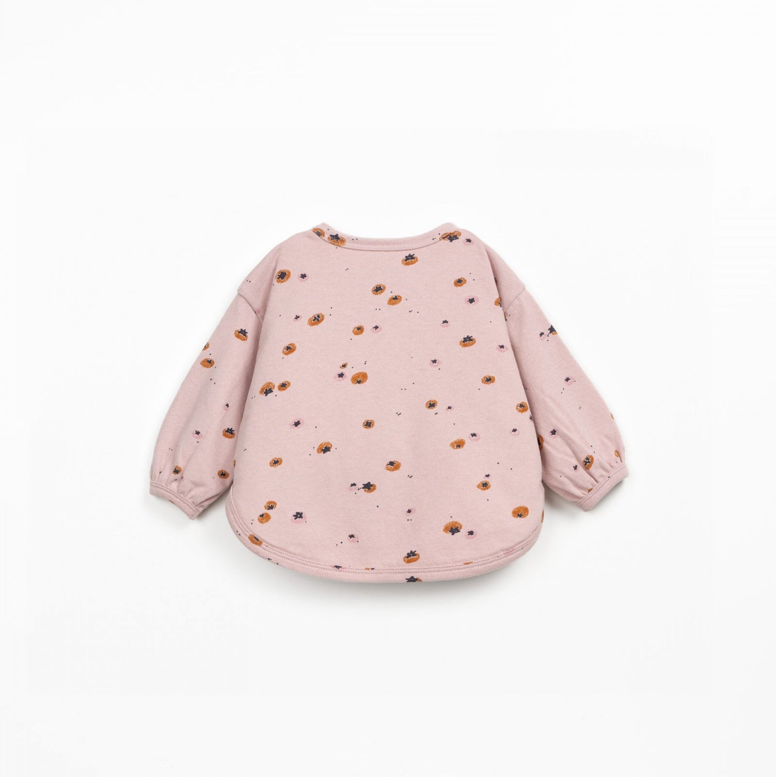 Pink sweatshirt with small patterns on a white background