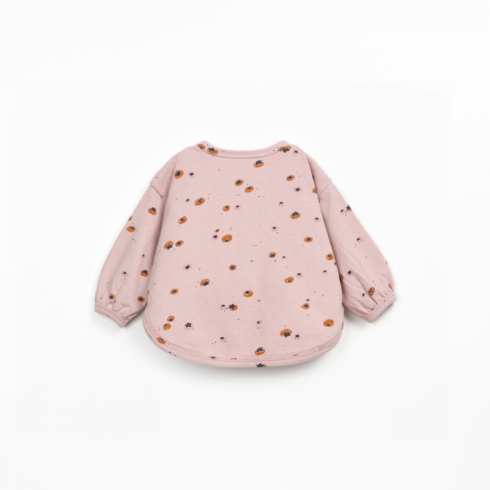 Pink sweatshirt with small patterns on a white background