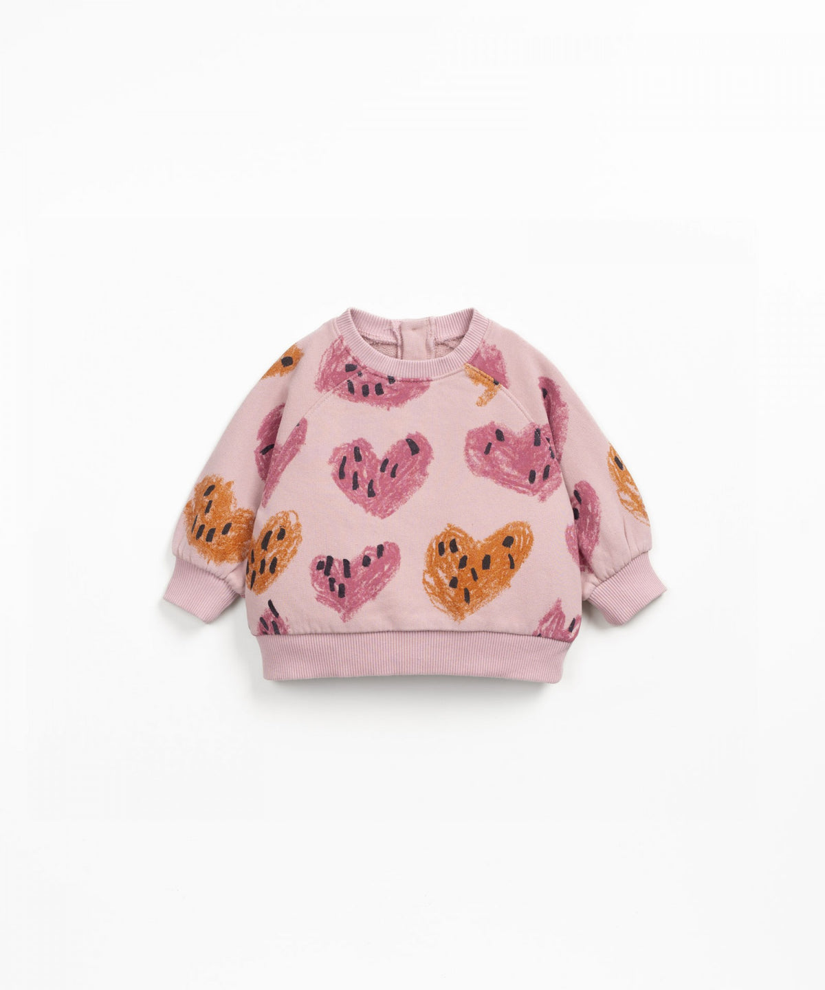 Pink children&#39;s sweatshirt with heart and flower patterns on a white background