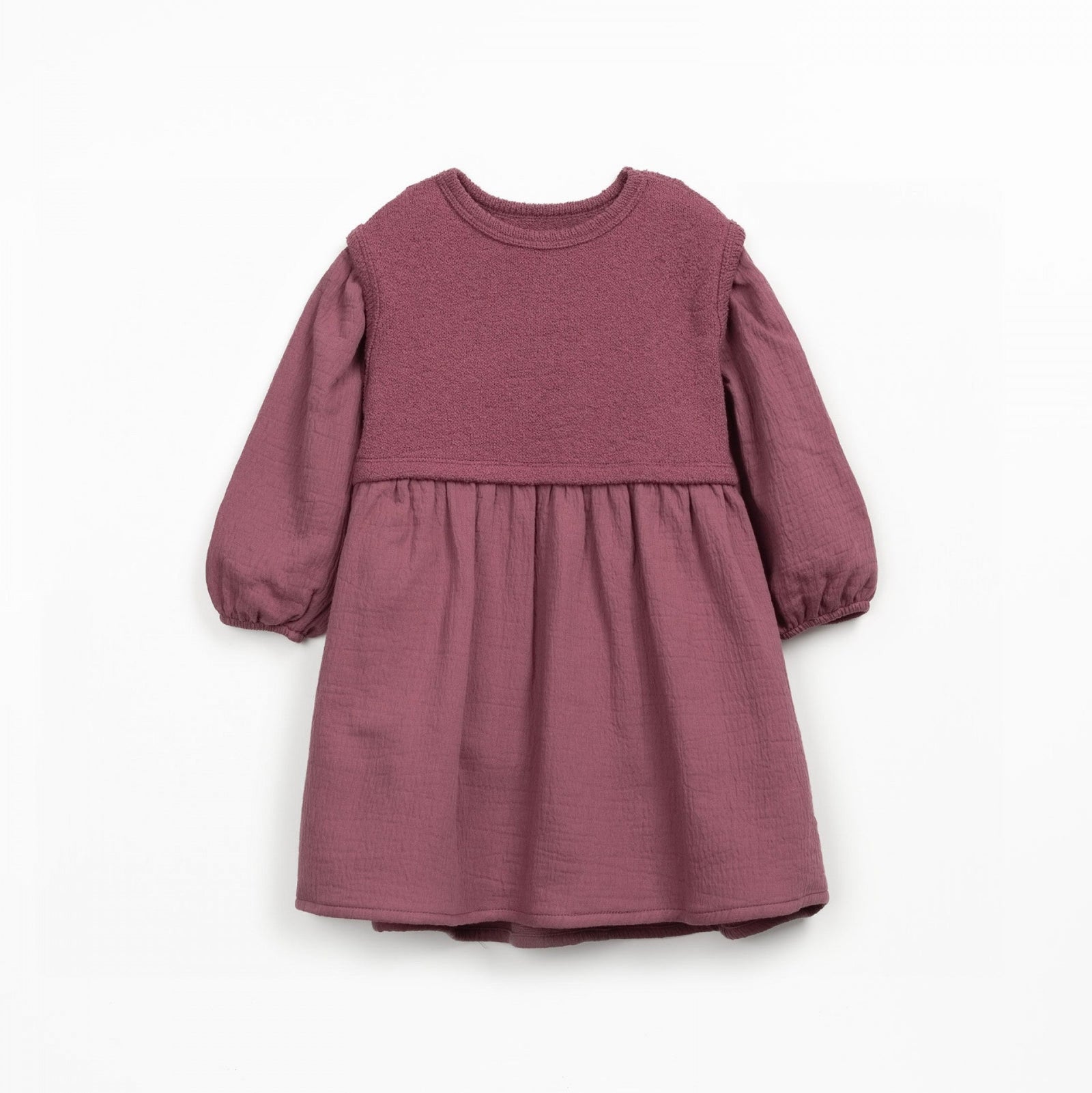 Children's clothing including a maroon dress, gray jacket, and purple tights on a light beige background.