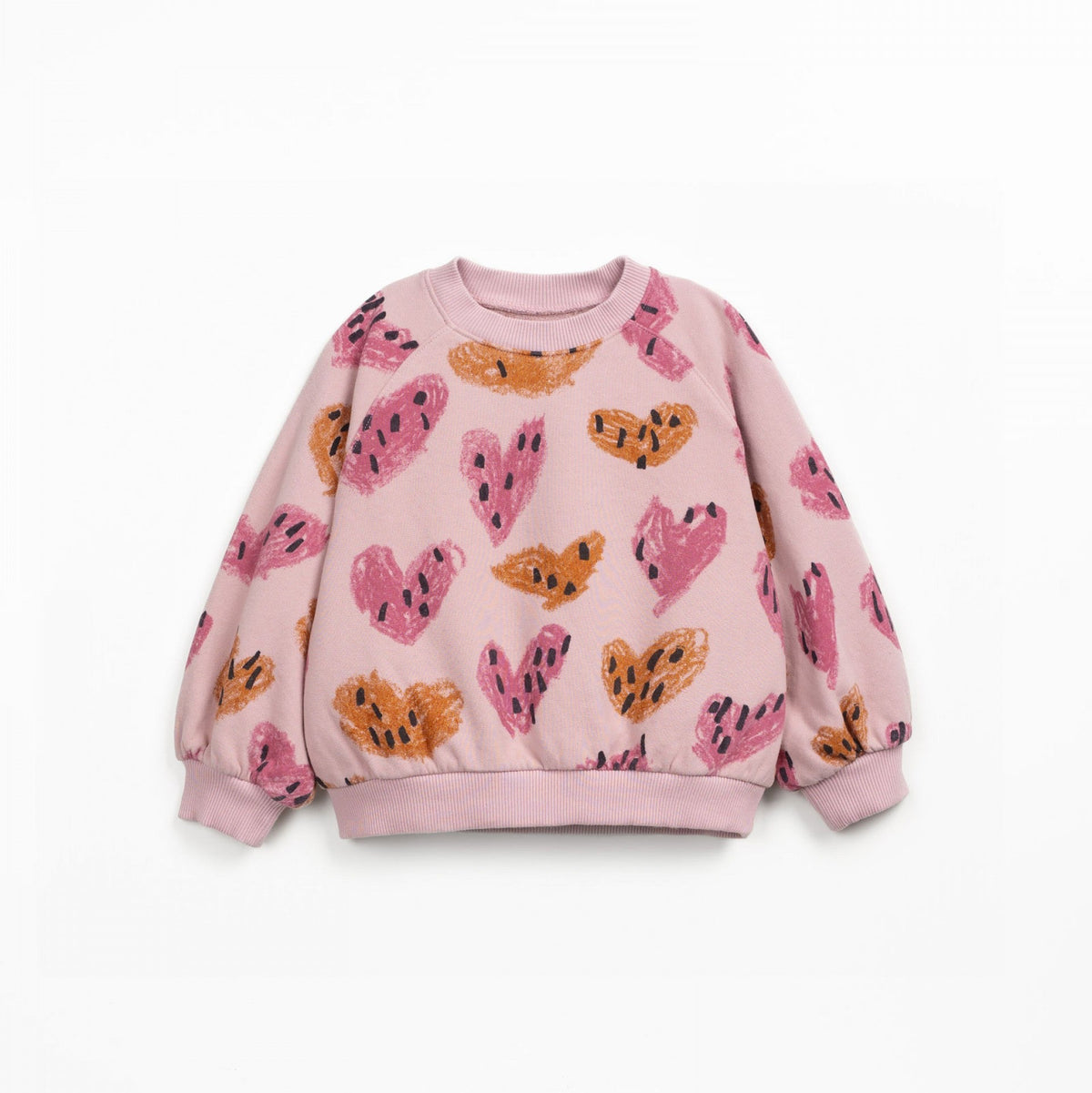 Pink sweatshirt with colorful heart patterns on a white background