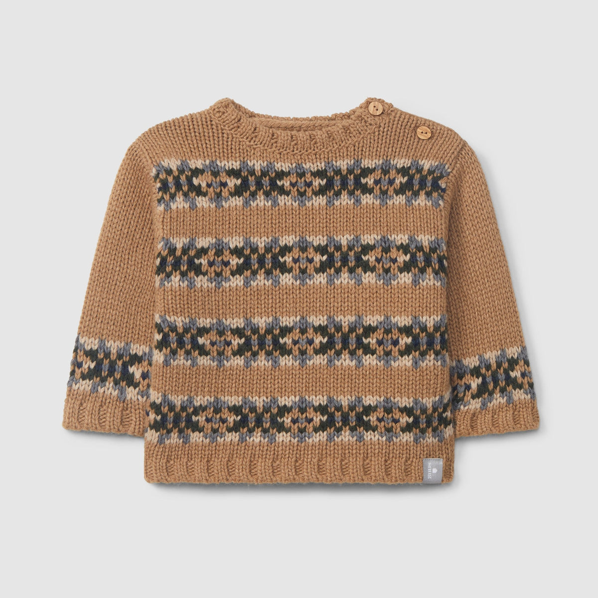 A baby knit sweater in a warm tan color with horizontal geometric patterns in dark gray, beige, and light blue-gray. The sweater features a crew neck, long sleeves, and a ribbed hem and cuffs, with two small buttons at the collar.