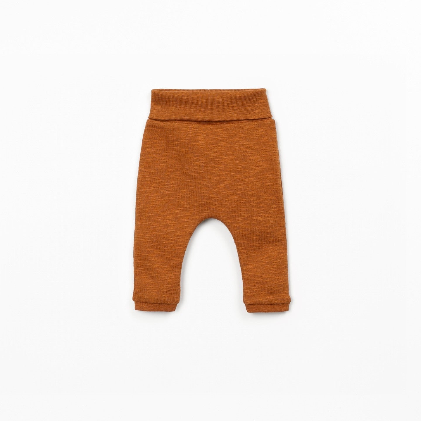 Brown baby pants on a white background