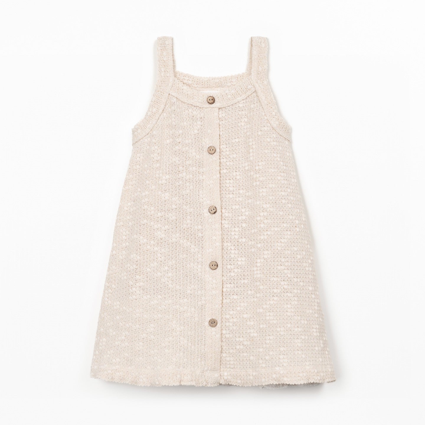 Young girl wearing a pink bucket hat against a plain background