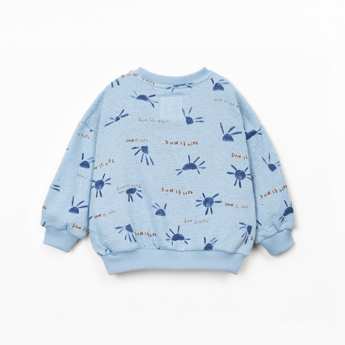 Light blue children's sweatshirt with dark blue patterns on a white background