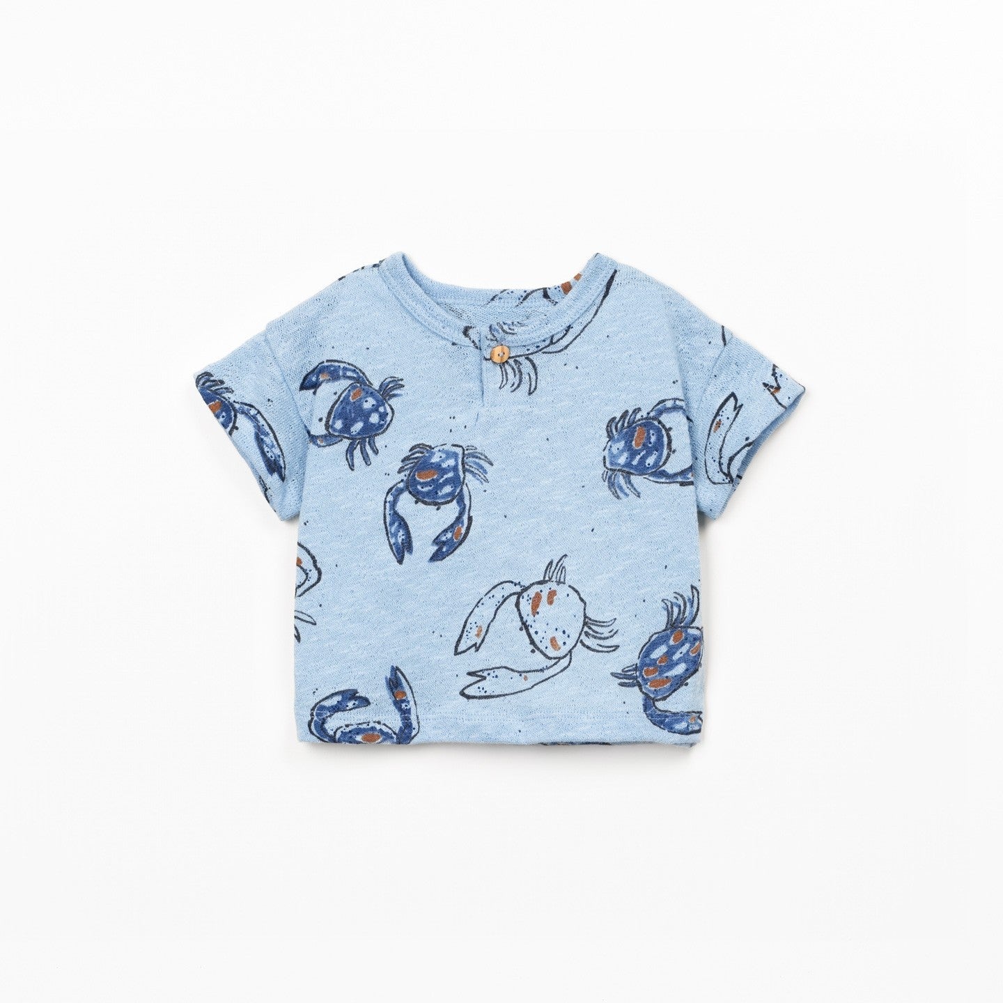 Blue t-shirt with crab pattern on a white background
