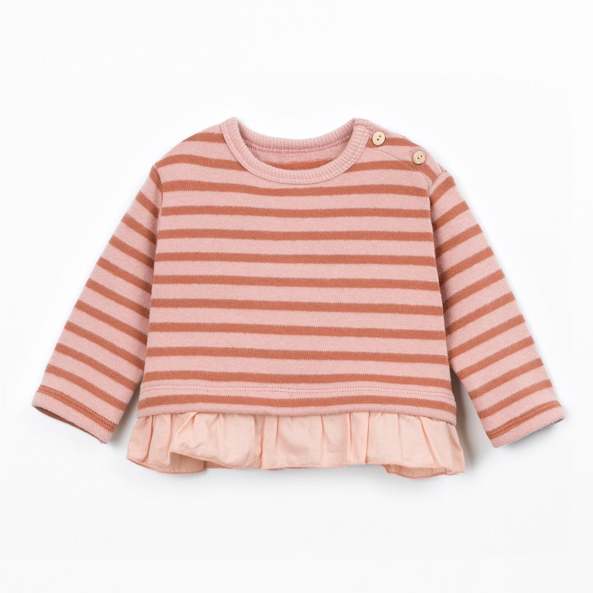A long-sleeve knit top featuring horizontal stripes in dusty rose and light pink, with a ruffled hem and two small decorative buttons on the shoulder, shown against a plain white background.