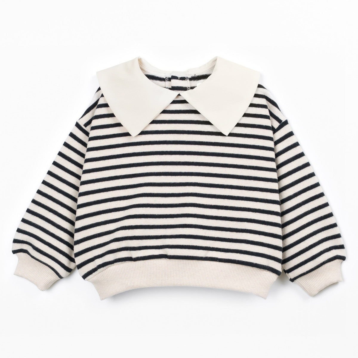 A children's long-sleeve knit top with black and off-white horizontal stripes, featuring a large off-white pointed collar, ribbed cuffs, and a ribbed hem, displayed flat against a white background.