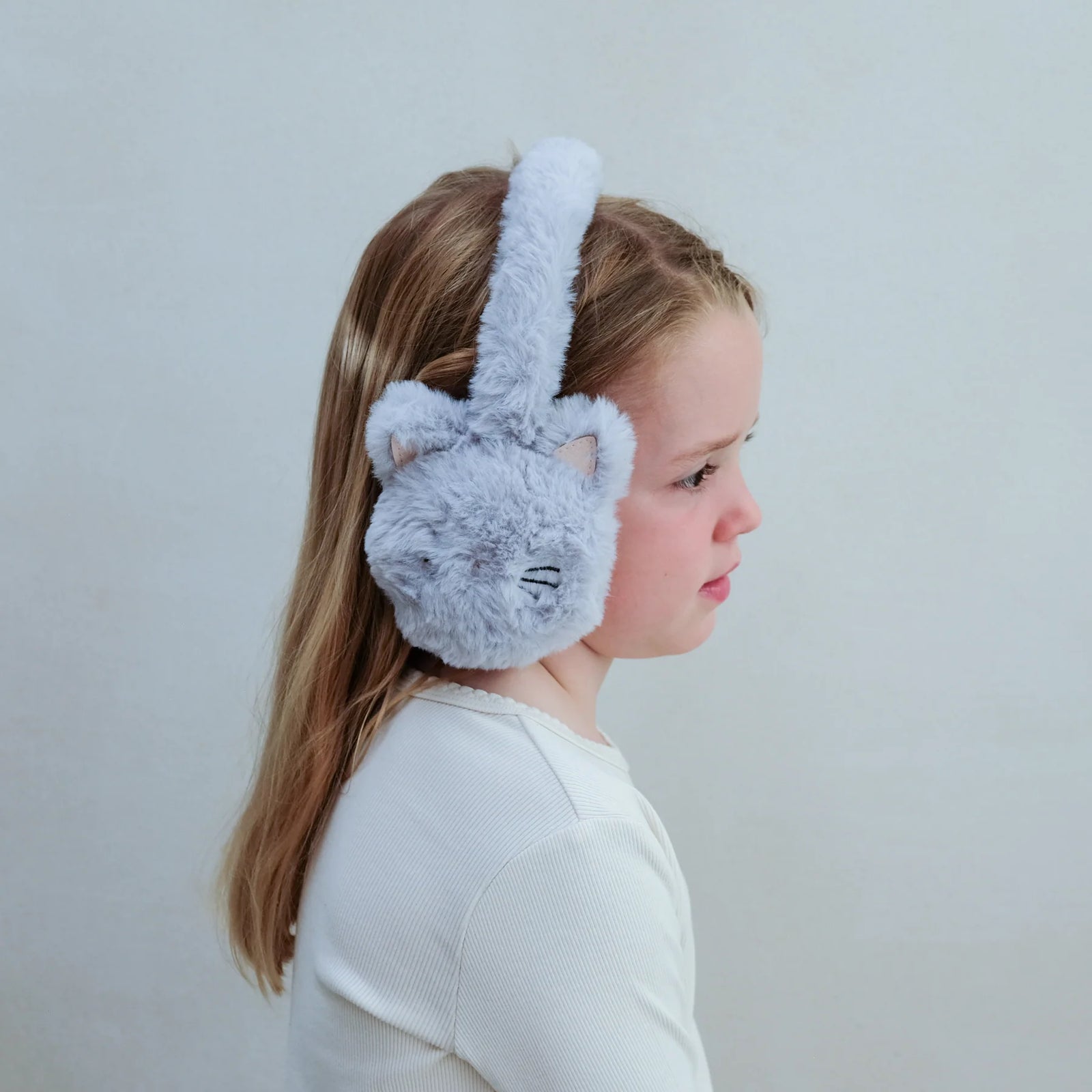 Gray cat-shaped earmuffs on a white background