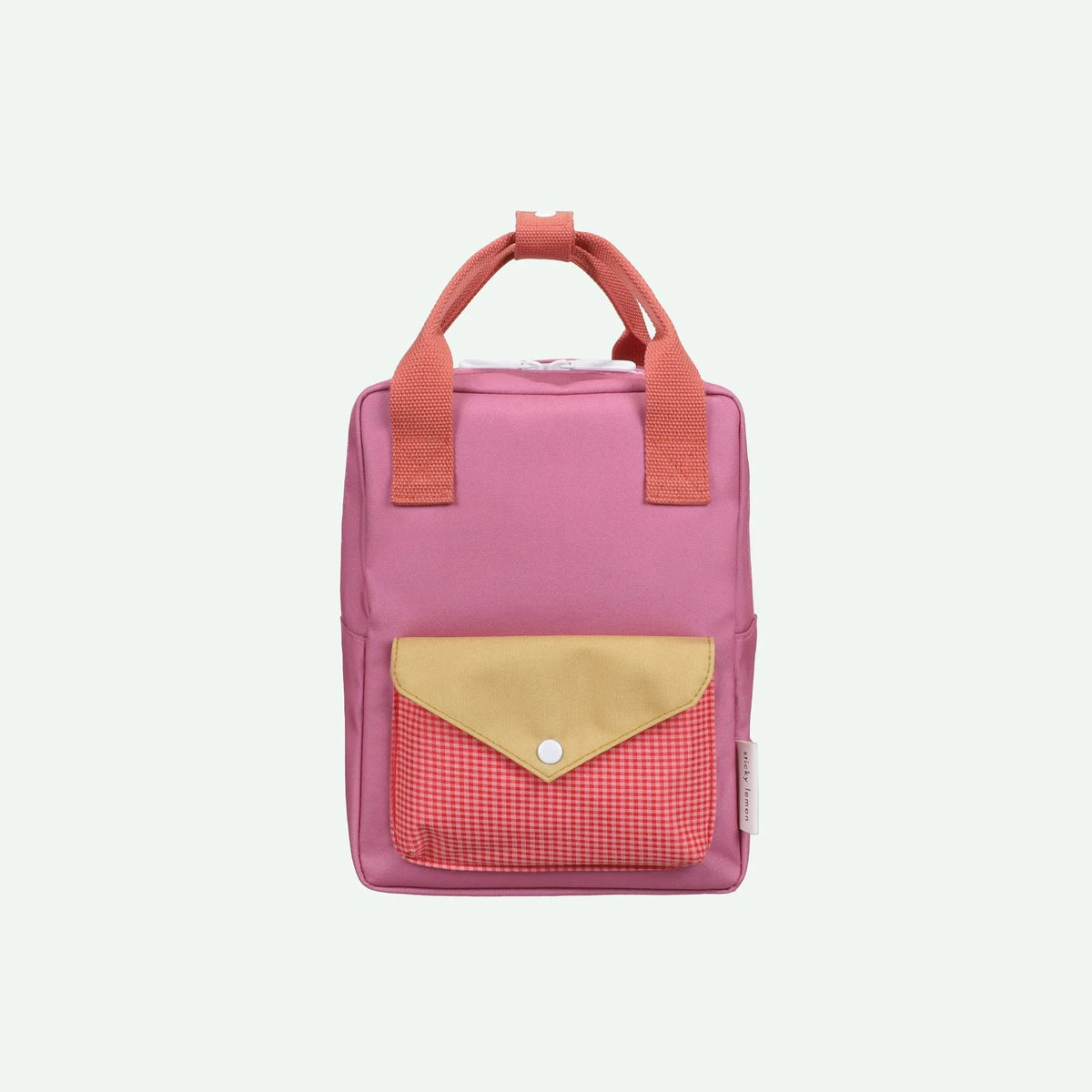 Pink backpack with a yellow pocket on a white background