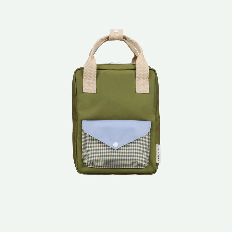 Green backpack with beige handles on a white background