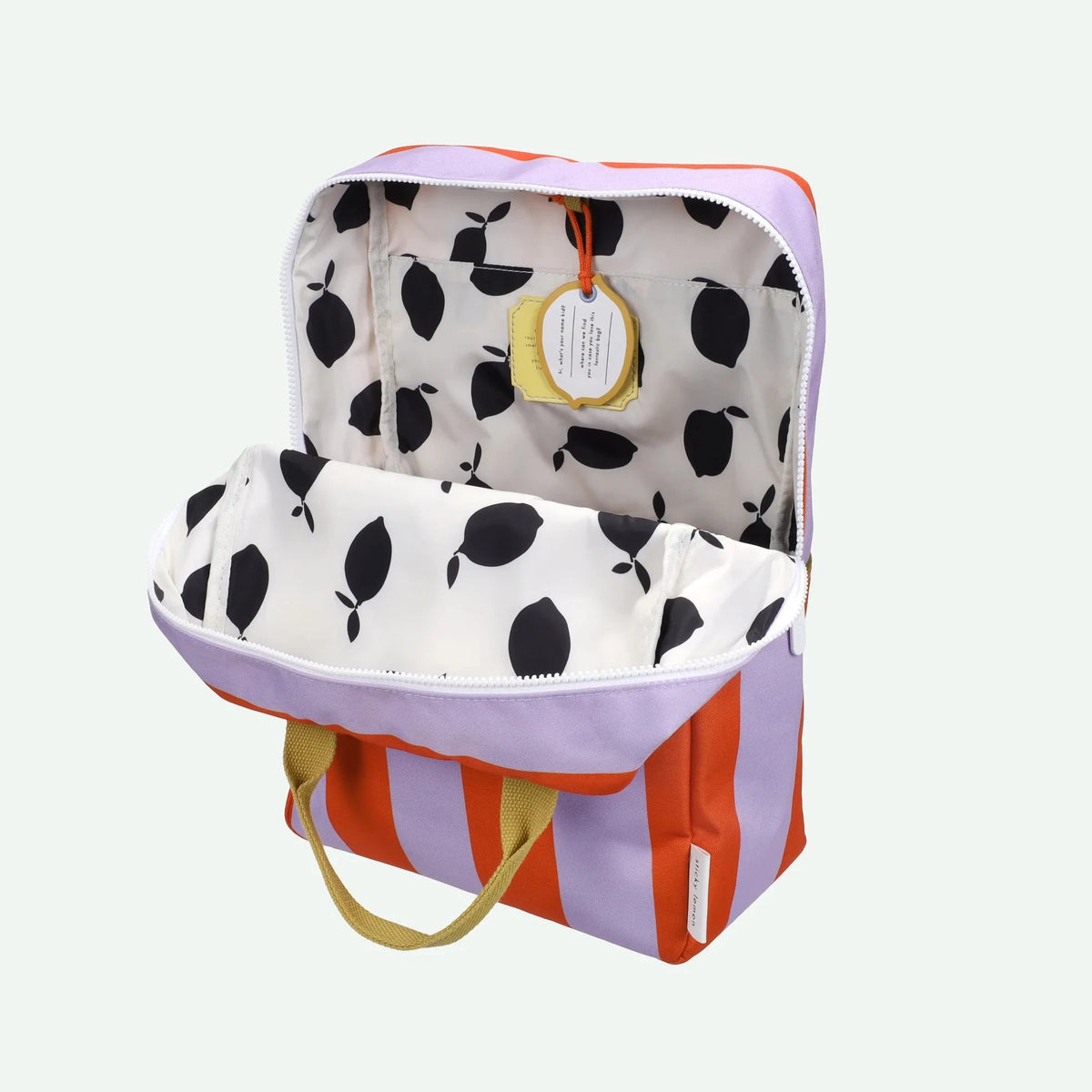 Colorful backpack with a polka dot interior on a white background