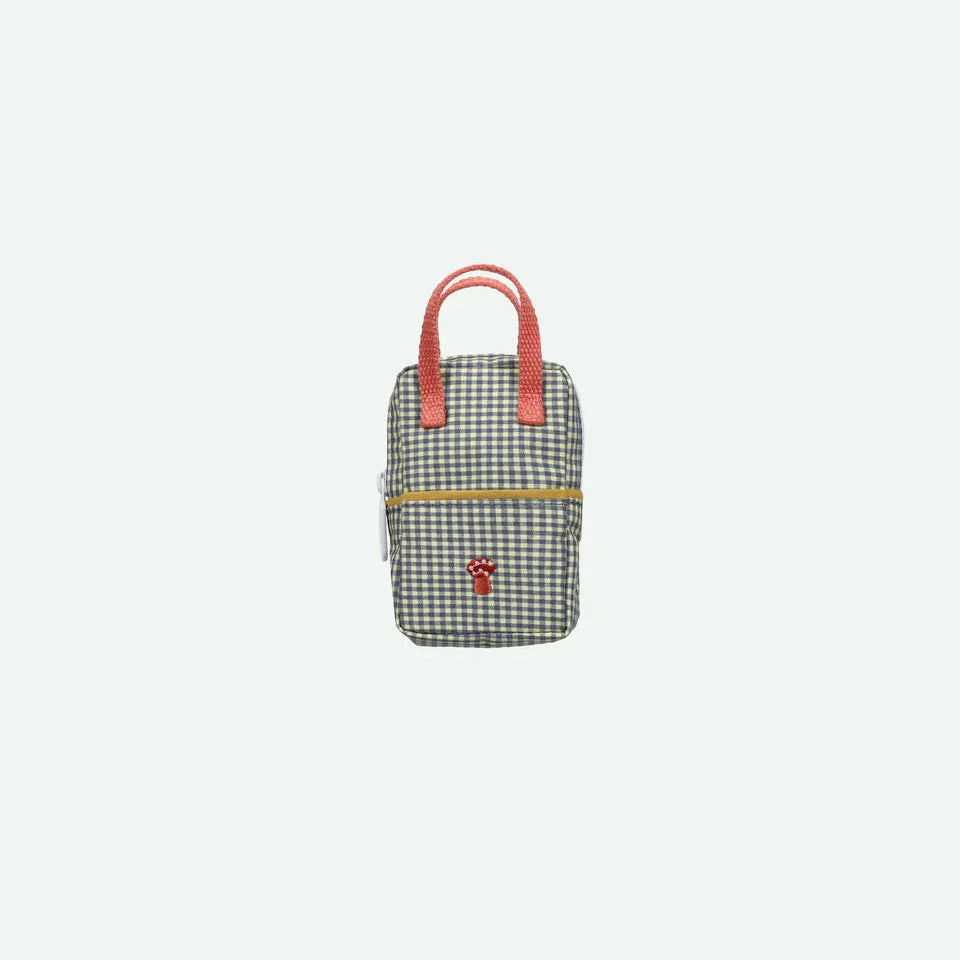 Small checkered bag with a pinkhandle on a light gray background