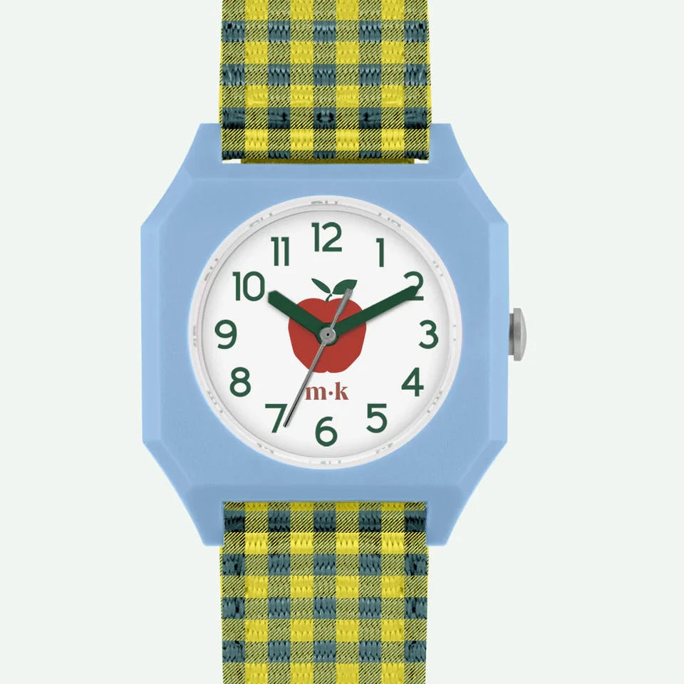 Children's watch with a blue case, yellow and green plaid strap, and red apple design on the face.