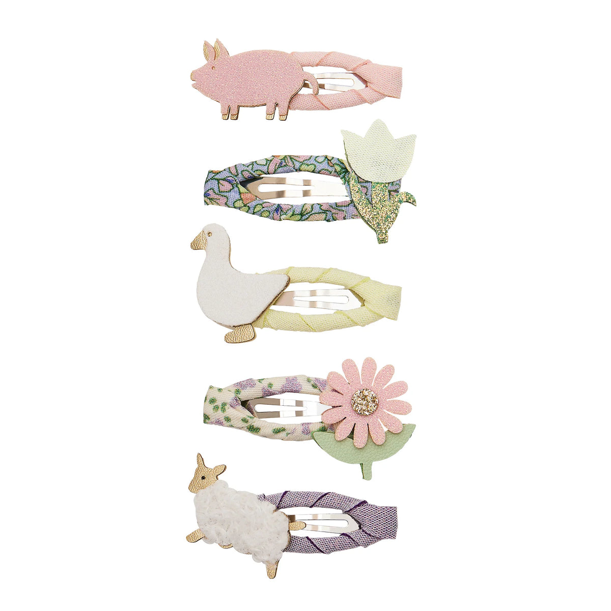 Set of animal-themed hair clips on a white background