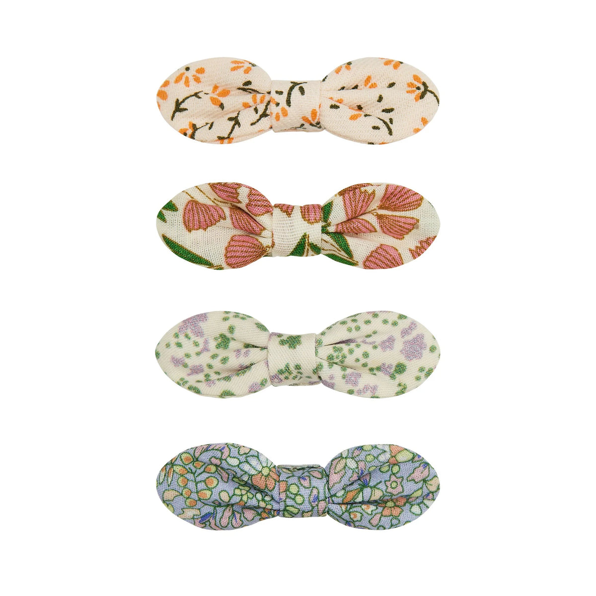 Set of four floral bow-shaped hair clips on a white background