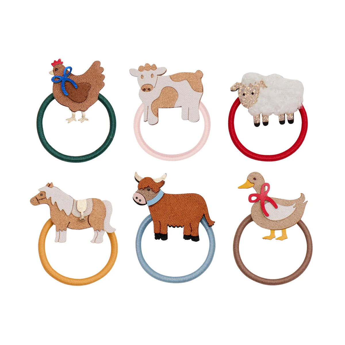 Six farm animal hair ties arranged in two rows on a white background, including a chicken, cow, sheep, horse, cow, and duck, each with a different colored band