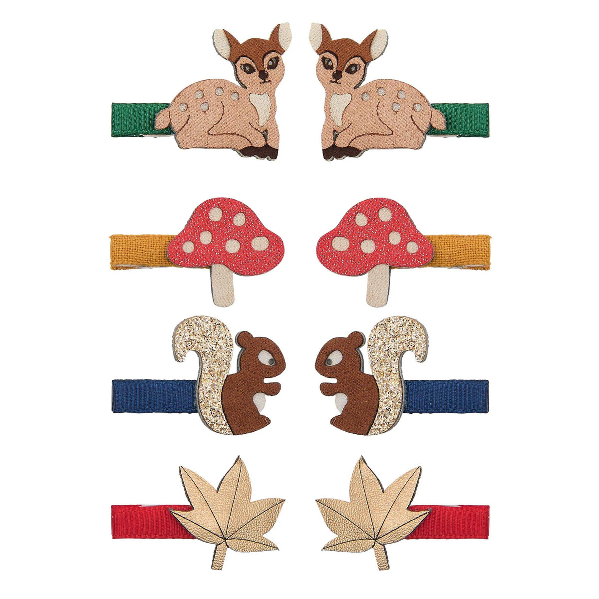 A set of six children's hair clips featuring woodland-themed designs including two deer clips, two red-and-white mushrooms, two squirrels, and two maple leaves, arranged on a plain white background.