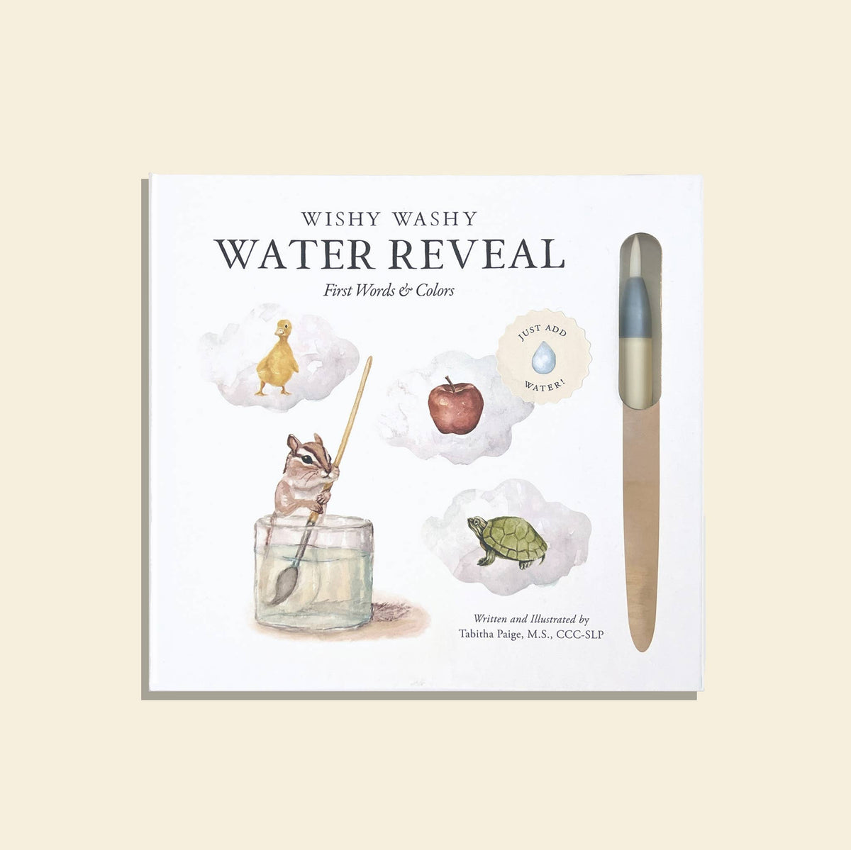 Wishy Washy water reveal book with pen on a beige background