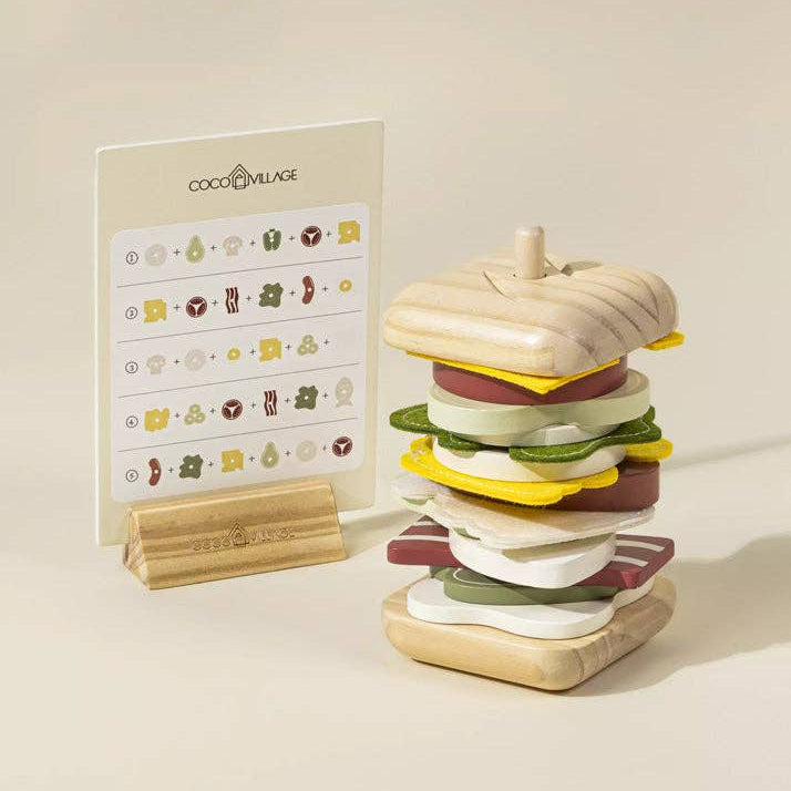 Wooden toy sandwich with a menu card on a beige background