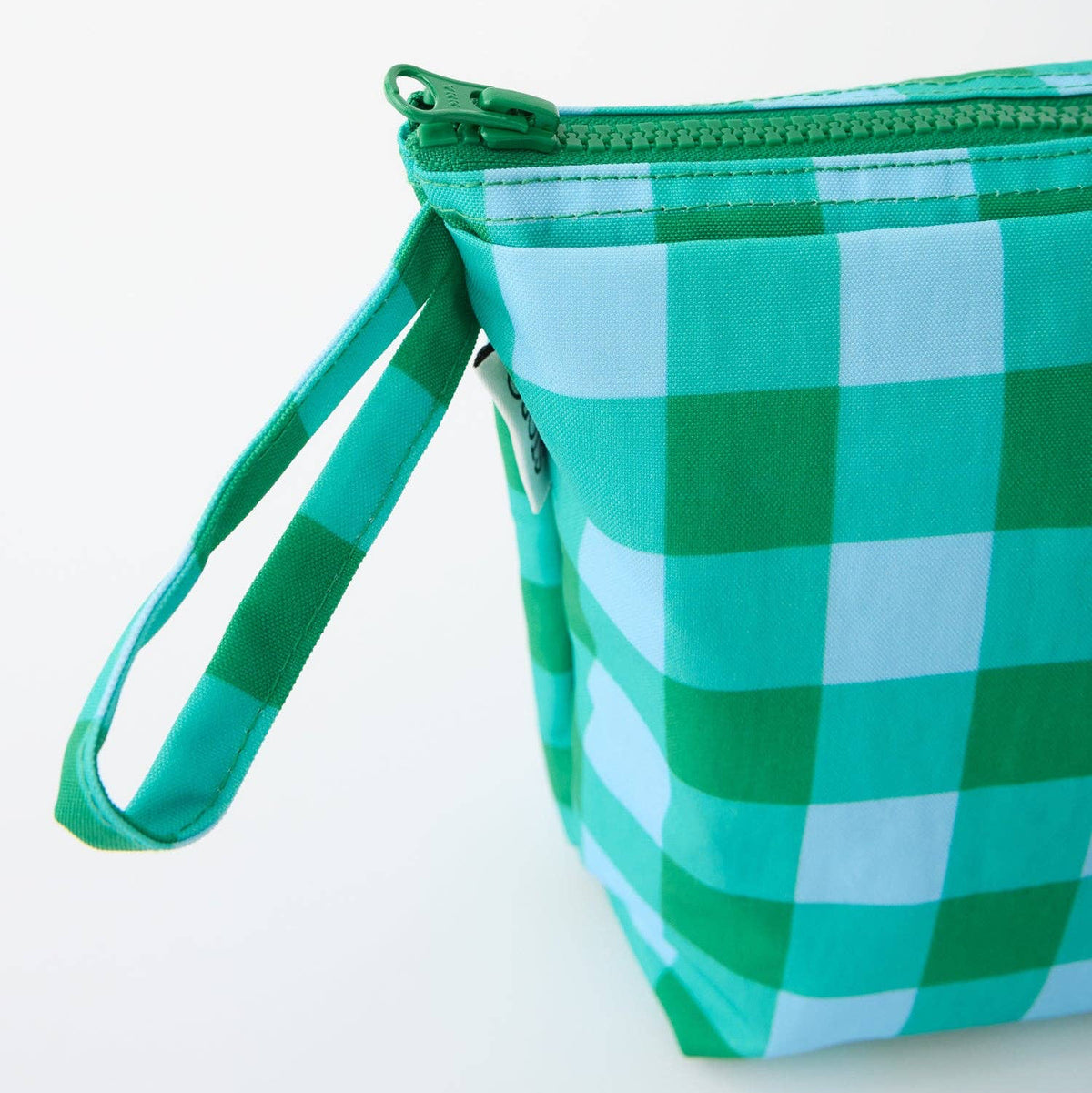 A green and white gingham checkered zippered pouch with a matching wrist strap, shown on a clean white background.
