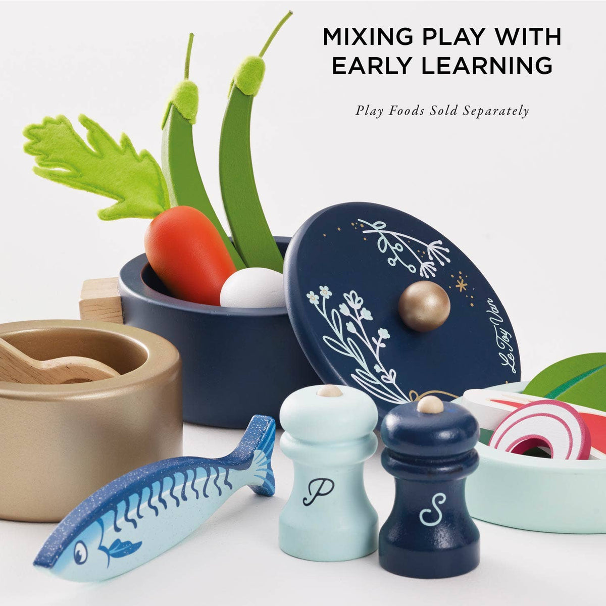 Set of wooden play food items and kitchen accessories on a white background with text 'Mixing Play with Early Learning'.
