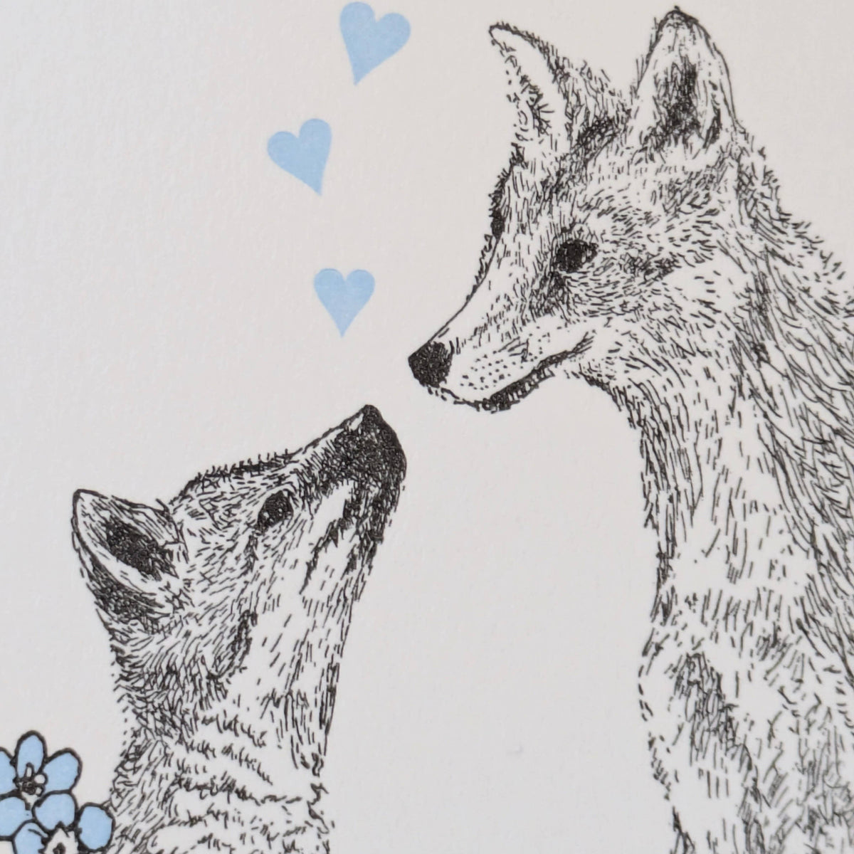 Illustration of two foxes facing each other with blue hearts above them on a light gray background.