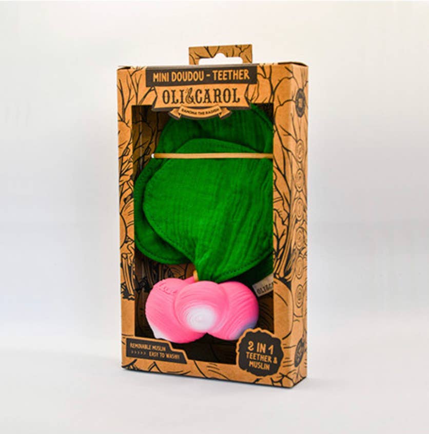 Green and pink teething toy in Oli &amp; Carol packaging on a white background